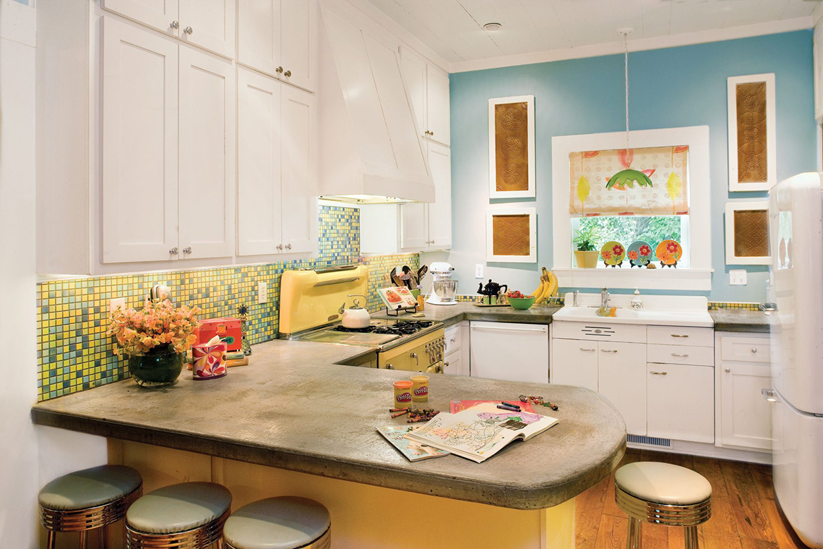 Colorful kitchen with under cabinet lights to make the room really stand out.