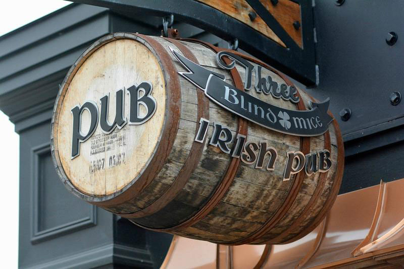 Outdoor bar signage for an Irish pub called "Three Blind Mice"